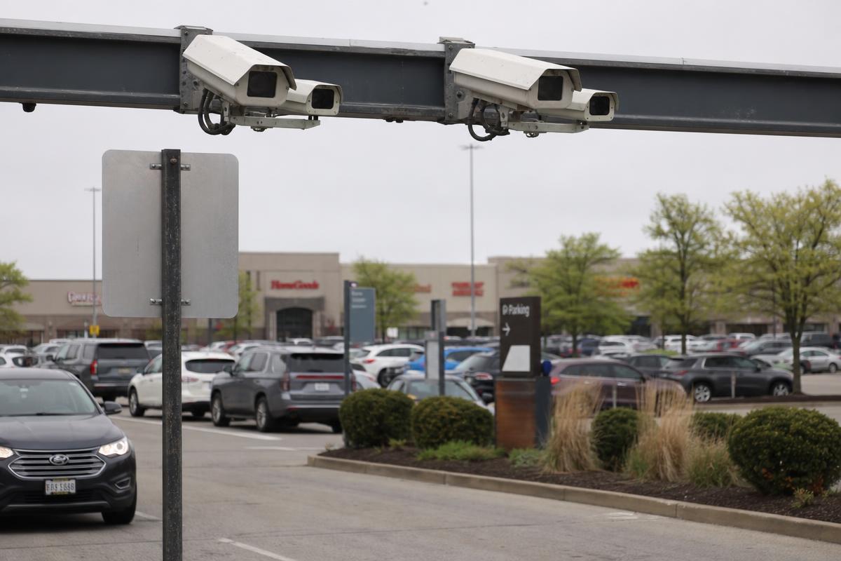 Fixed ALPR camera mounted at a parking lot entrance